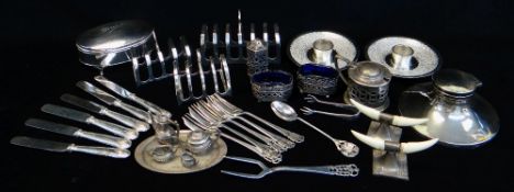 ASSORTED SILVER COLLECTIBLES, including three toast racks, capstan inkwell, four-piece cruet (