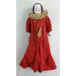 LATE 19TH CENTURY GERMAN CHINA SHOULDER-HEAD DOLL, with china lower limbs, cloth body, painted
