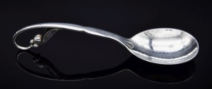 GEORG JENSEN SILVER PRESERVE SPOON, model 21 designed by Johan Rhode, with leaf and berry loop
