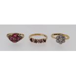 THREE GOLD RINGS comprising 18ct gold & platinum diamond cluster ring, 12ct gold ruby ring and a 9ct