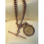 9CT GOLD ALBERT WATCH CHAIN, having flat graduated curb links, T-bar and 1903 sovereign pendant,