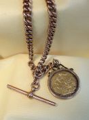 9CT GOLD ALBERT WATCH CHAIN, having flat graduated curb links, T-bar and 1903 sovereign pendant,