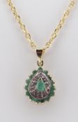 9CT GOLD EMERALD & DIAMOND CHIP PENDANT on 14ct gold chain, 4.4gms