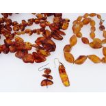 TWO BALTIC AMBER BEAD NECKLACES, and two single earnings, tot. gross wt appr. 150g (4)