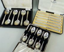 THREE BOXED CUTLERY FLATWARE SETS including set of six George V tea spoons with initialed handles,