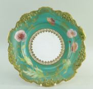 DOULTON BURSLEM cabinet plate, florally decorated on a green ground within gilt borders, signed W.