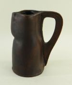 SMALL LEATHER BLACK-JACK JUG, 15cms high