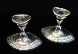 PAIR OF GEORGE V SILVER DWARF CANDLESTICKS, Birmingham 1932 by Barker Bros Limited, neoclassical