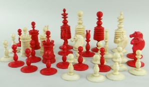 19TH CENTURY ENGLISH BARLEYCORN BONE CHESS SET, stained red and natural, kings 9.5cms, pawns 4.2cms,