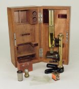 VINTAGE ERNST LEITZ MONOCULAR MICROSCOPE, no. 151471, lacquered brass with two eyepieces and three