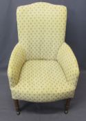 VINTAGE REUPHOLSTERED ARMCHAIR - on turned front supports and black pot castors, 96cms H, 61cms W,