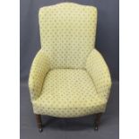 VINTAGE REUPHOLSTERED ARMCHAIR - on turned front supports and black pot castors, 96cms H, 61cms W,