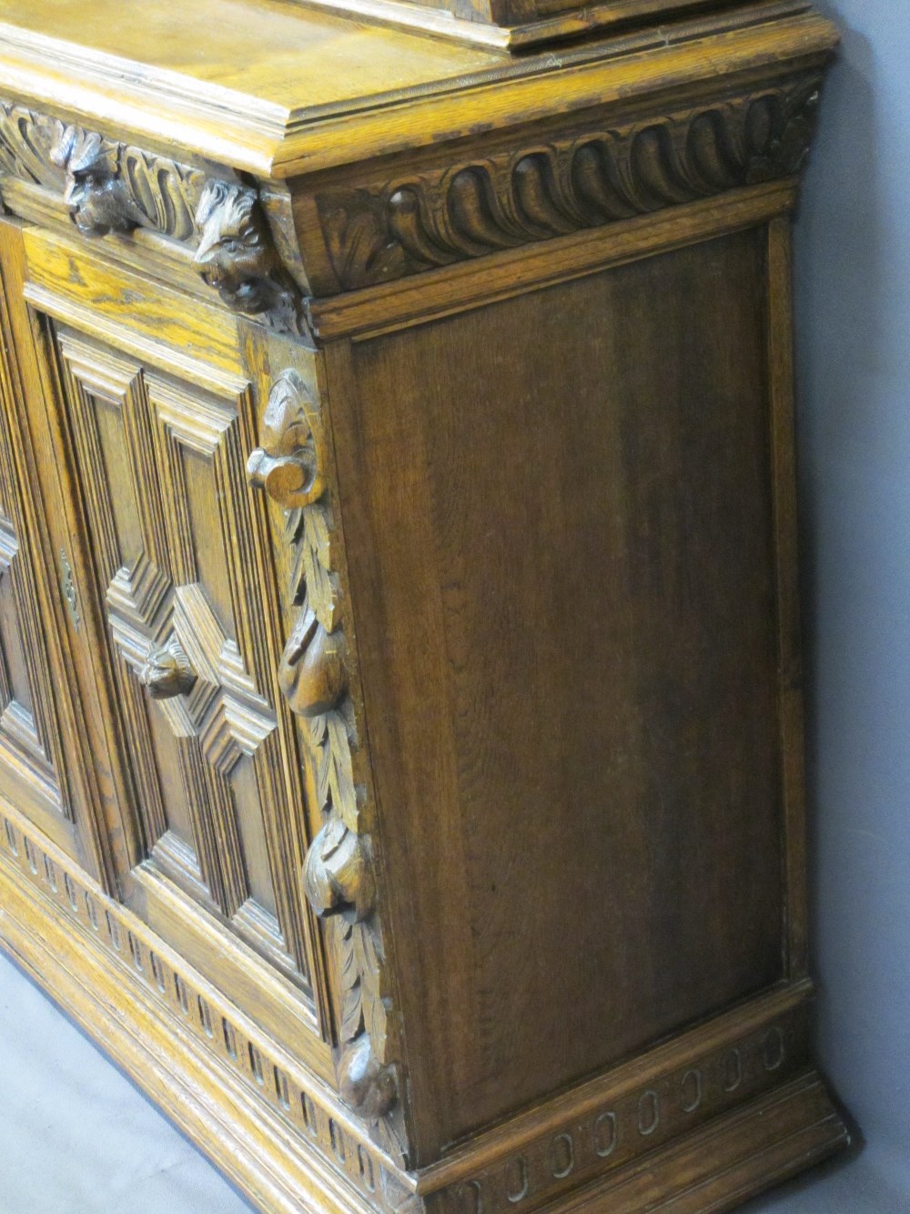 CONTINENTAL STYLE CARVED OAK BOOKCASE SIDEBOARD - with leaded coloured glass upper doors, lion mask, - Image 6 of 11