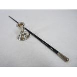 SILVER MOUNTED CONDUCTOR'S BATON and a small squat candlestick, London 1952, maker's stamp 'F D',