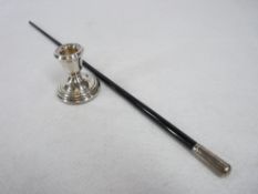 SILVER MOUNTED CONDUCTOR'S BATON and a small squat candlestick, London 1952, maker's stamp 'F D',