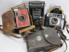 VINTAGE CAMERAS (3) to include a Kodak Junior No 1 bellows camera, cased, a red Brownie, cased,