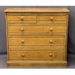 CIRCA 1900 SCUMBLED PINE CHEST - two short over three long drawers with turned walnut knobs on a