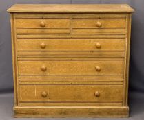 CIRCA 1900 SCUMBLED PINE CHEST - two short over three long drawers with turned walnut knobs on a