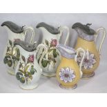 ANTIQUE JUGS (5) - a set of three having pewter lidded mounts and briar rose transfer decoration and