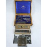 OAK CASED DRAWING INSTRUMENT SET - the interior marked 'Winsor & Newton Ltd London' and a quantity