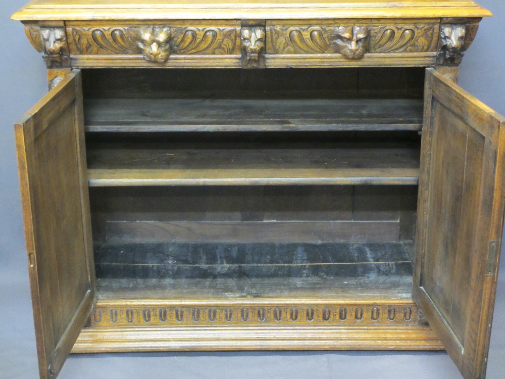 CONTINENTAL STYLE CARVED OAK BOOKCASE SIDEBOARD - with leaded coloured glass upper doors, lion mask, - Image 9 of 11