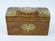 WALNUT TEA CADDY - oblong with dome lid having studded brass corner and central decoration and key