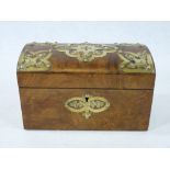 WALNUT TEA CADDY - oblong with dome lid having studded brass corner and central decoration and key