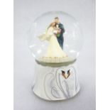 TWINKLE MUSICAL SNOW TYPE GLOBES - depicting a Wedding Couple (4), boxed