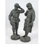 CAST SPELTER FIGURINES, A PAIR - a young schoolgirl and boy on circular bases, no visible signatures