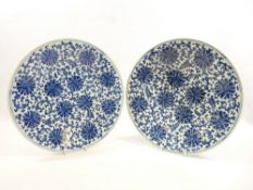 CHINESE PROVINCIAL BLUE & WHITE CHARGERS, A PAIR - 34cm diameters, probably 20th century,