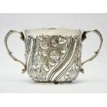 A SILVER TWIN-HANDLED CUP - with floral and swirled decoration, 4.3 ozt, London 1897