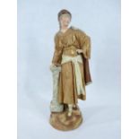 RUDOLSTADT PORCELAIN FIGURINE - of a cloaked maiden against a Corinthian capped column, printed
