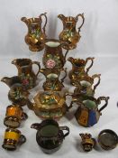 VICTORIAN COPPER LUSTRE WARE, 15 PIECES including diamond shape jugs with matching painted detail,