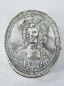 MARIE ANTOINETTE - an oval white metal lidded trinket box, the lid having a raised profile of