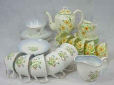 SUSIE COOPER PART TEA SET & A SUTHERLAND BONE CHINA PART COFFEE SET with coffee pot and cover, 20