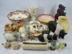 MIXED POTTERY, PORCELAIN with a quantity of carved wooden and composite pig figurines, the pottery