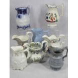 ANTIQUE RELIEF MOULDED & HAND PAINTED JUGS (8) - four having elephant and camel drawn carriage