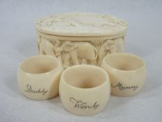 IVORY NAPKIN RINGS (3) - each decorated with an animal and inscribed 'Wendy, Mummy, Daddy' and the