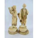 LARGE PAIR OF ROYAL WORCESTER FIGURINES BY JAMES HADLEY - depicting an Eastern man and woman in