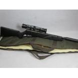 AS NEW BLACK REMINGTON TYRANT .22 CALIBRE AIR RIFLE WITH SIGHTS and canvas carry bag, 106.5cms L,