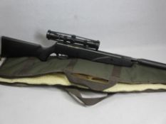 AS NEW BLACK REMINGTON TYRANT .22 CALIBRE AIR RIFLE WITH SIGHTS and canvas carry bag, 106.5cms L,