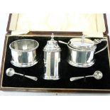 A CASED THREE PIECE SALT & PEPPER CONDIMENT SET (one blue glass liner missing), each piece of