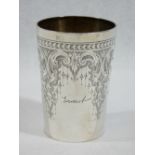 A SILVER BEAKER - slightly tapered with attractive scrolled and droplet decoration with