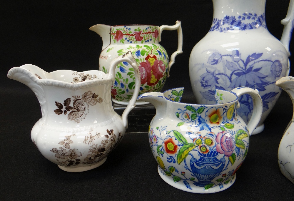 SEVEN VARIOUS WELSH POTTERY JUGS including named Swansea floral decorated jug for 'John Jenkins - Image 3 of 5