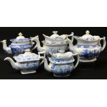 FIVE ANTIQUE WELSH POTTERY TEAPOTS, each in various blue and white transfer patterns including '