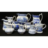 GROUP OF TEN SWANSEA POTTERY BLUE & WHITE TRANSFER JUGS including large 'Milan' transfer jug,