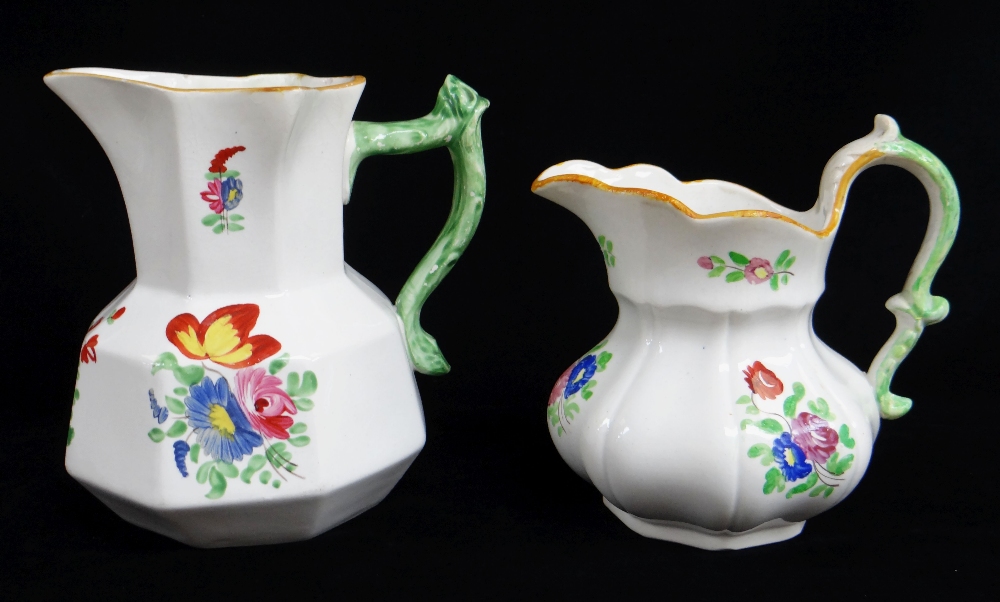 FIVE SWANSEA POTTERY JUGS including graduated trio, all with green twig-handles, enamelled flowers - Image 2 of 3