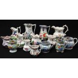 COLLECTION OF FOURTEEN COLOURFUL WELSH POTTERY JUGS painted and transfer decorated, Llanelly and