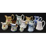 COLLECTION OF YNYSMEUDWY POTTERY JUGS, believed all Ynysmeudwy pottery, moulded and transfer