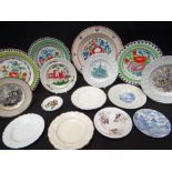 GROUP OF WELSH POTTERY DECORATIVE PLATES including three floral enamelled arcaded border plates with